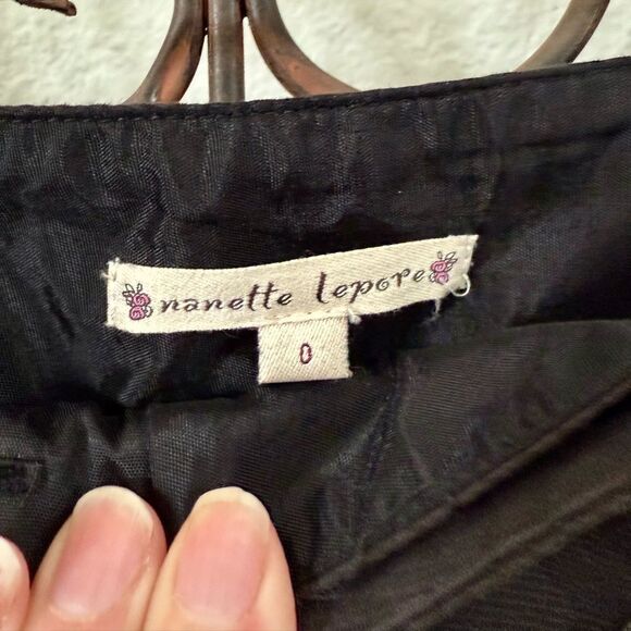 Black High-Waisted Wide-Leg Pants with Button Detail - Picture 10 of 11